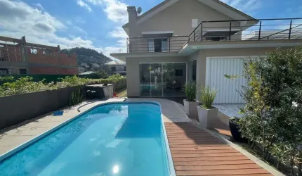 Casa em condomínio fechado com 3 quartos para alugar na Avenida Marcio Ferreira de Mello e Silva, 125, Praia Brava, Itajaí, 200 m2 por R$ 32.000