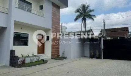 Sobrado geminado em condomínio fechado
