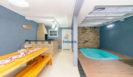 Sobrado em condomínio com piscina privativa | 3 quartos (suíte) | 269 m2 no Xaxim – Curitiba/PR