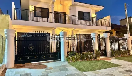 Casa com 5 quartos à venda na Rua Inambuí, 10, Atlântida, Xangri-Lá por R$ 3.500.000