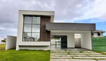Casa com 3 dormitórios à venda, 129 m² por R$ 820.000,00 - Alphaville Camaçari - Camaçari/BA