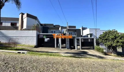 Casa com 3 dormitórios, sendo duas suítes uma com closet, todos dormitórios com sacada, pátio, ótima localização à venda em Novo Hamburgo, Ideal.