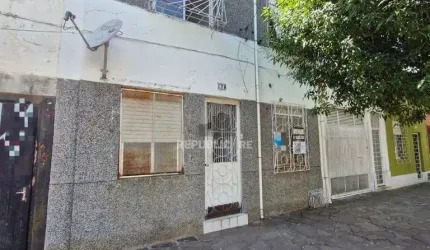 Residência no Bairro Azenha, com quatro dormitórios