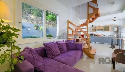 Living em dois ambientes com cozinha americana, lavabo, pátio, lavanderia. o3 do