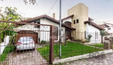Casa 303m² - 4 dormitórios, 2 vagas no bairro Santo Antônio