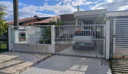 Casa de 2 dormitórios, com banheiro social, e um living em 2 ambientes, com banh