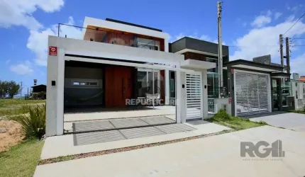 Casa 3 dormitórios à venda Zona Nova Capão da Canoa/RS