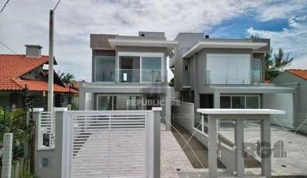 Casa 3 dormitórios à venda Zona Nova Capão da Canoa/RS