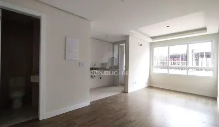 APARTAMENTO 1 DORMITÓRIO COM SUÍTE, COZINHA AMERICANA, LAVABO E AMPLO LIVING NO