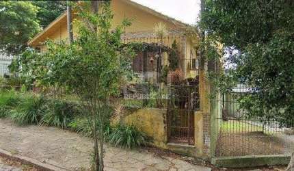 Casa 4 dormitórios à venda Parque Santa Fé Porto Alegre/RS