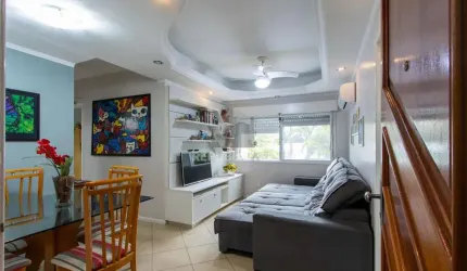 Apartamento de 2 quartos, living, cozinha planejada, área de serviço e 1 vaga.