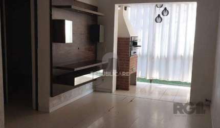 Vende-se apartamento 2 dorm com vaga, sacada com churrasqueira - 64m² - Partenon