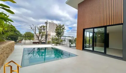 Espetacular casa de alto padrão com 3 suítes e elevador no bairro América