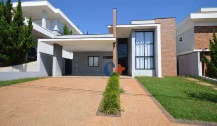Casa com 3 dormitórios à venda, 207 m² por R$ 1.650.000,00 - Condomínio Terras do Cancioneiro - Paulínia/SP