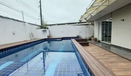 Casa com 4 dormitórios à venda, 290 m² por R$ 990.000,00 - Jardim Guaiuba - Guarujá/SP