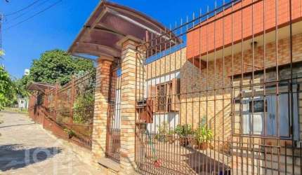 Casa com 5 quartos à venda na Rua Umbú, 566, Passo da Areia, Porto Alegre, 192 m2 por R$ 1.500.000
