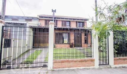 Casa com 6 quartos à venda na Rua Professor Pedro Santa Helena, 255, Jardim do Salso, Porto Alegre, 300 m2 por R$ 850.000