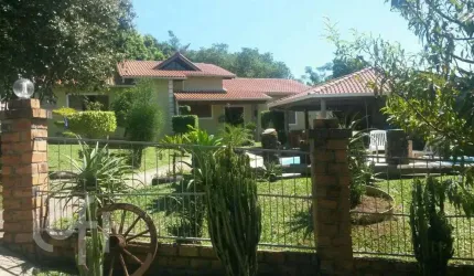 Casa com 4 quartos à venda na Olmiro Lametta Viegas, 6, Hípica, Porto Alegre, 260 m2 por R$ 950.000
