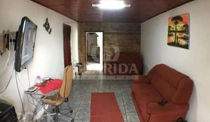 Casa com 2 quartos à venda na Rua Professor Rubens Guelli, 105, Vila Nova, Porto Alegre, 200 m2 por R$ 400.100