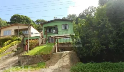 Casa com 5 quartos à venda na Avenida Professor Oscar Pereira, 6798, Cascata, Porto Alegre, 280 m2 por R$ 500.000