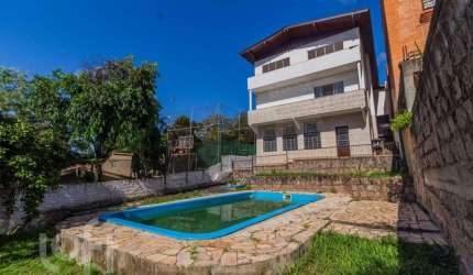 Casa com 4 quartos à venda na Praça São Caetano, 84, Teresópolis, Porto Alegre, 432 m2 por R$ 1.590.000