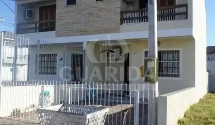 Casa em condomínio fechado com 3 quartos à venda na Rua Embira, 98, Hípica, Porto Alegre, 110 m2 por R$ 498.000