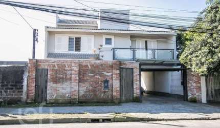Casa com 6 quartos à venda na Rua Arapei, 228, Nonoai, Porto Alegre, 500 m2 por R$ 1.200.000