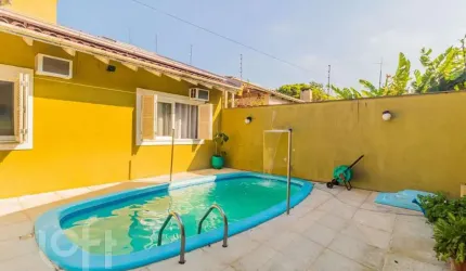 Casa com 4 quartos à venda na Avenida Mário Meneghetti, 694, Passo das Pedras, Porto Alegre, 460 m2 por R$ 1.800.000