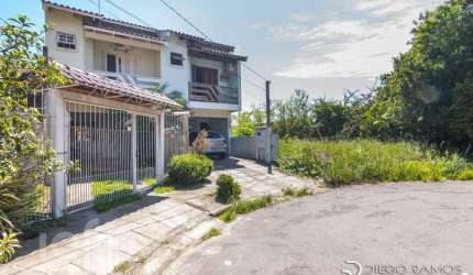 Casa com 2 quartos à venda na Rua Michael Motta Seelig, 58, Hípica, Porto Alegre, 112 m2 por R$ 324.900