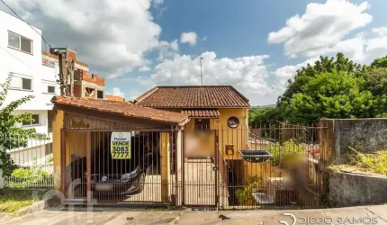 Casa com 4 quartos à venda na Rua Padre João Batista Reus, 2778, Camaquã, Porto Alegre, 163 m2 por R$ 420.000