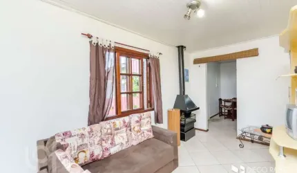 Casa com 4 quartos à venda na Avenida João Ferreira Jardim, 711, Rubem Berta, Porto Alegre, 293 m2 por R$ 604.200