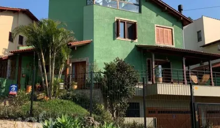 Casa com 4 quartos à venda na Rua Arachanes, 189, Espírito Santo, Porto Alegre, 303 m2 por R$ 1.250.000