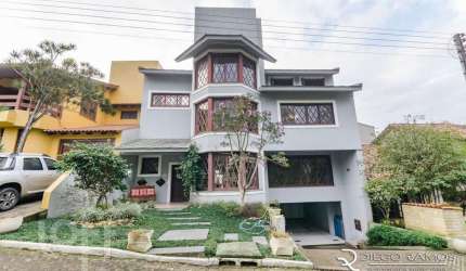 Casa em condomínio fechado com 3 quartos à venda na Rua Tocantins, 869, Agronomia, Porto Alegre, 385 m2 por R$ 1.700.000