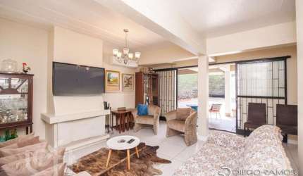 Casa com 5 quartos à venda na Rua Professor Cristiano Fischer, 1138, Jardim do Salso, Porto Alegre, 375 m2 por R$ 905.000