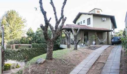 Casa com 4 quartos à venda na Rua Sepé Tiaraju, 1159, Nonoai, Porto Alegre, 379 m2 por R$ 1.200.000