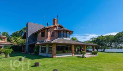 Casa em condomínio fechado com 5 quartos à venda na Rua dos Pescadores, 4600, Arquipélago, Porto Alegre, 450 m2 por R$ 5.989.000