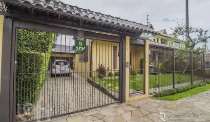 Casa com 3 quartos à venda na Rua Professor Guerreiro Lima, 585, Partenon, Porto Alegre, 240 m2 por R$ 1.200.000