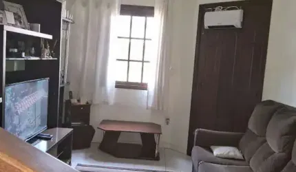 Casa com 3 quartos à venda na Rua Amaury Silveira, 355, Rubem Berta, Porto Alegre, 125 m2 por R$ 427.000