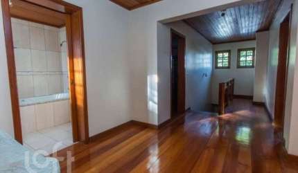 Casa com 5 quartos à venda na Rua Afonso Arinos, 475, Camaquã, Porto Alegre, 277 m2 por R$ 890.000