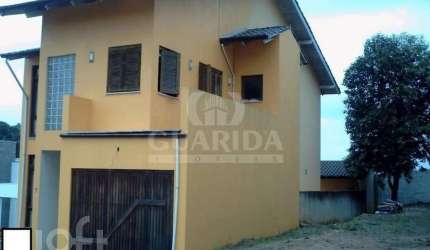 Casa em condomínio fechado com 3 quartos à venda na Beco Juca Batista, 2705, Espírito Santo, Porto Alegre, 190 m2 por R$ 550.000