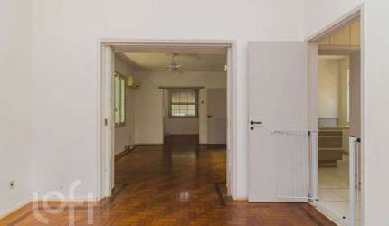 Casa com 4 quartos à venda na Rua Xavier Ferreira, 113, Auxiliadora, Porto Alegre, 209 m2 por R$ 1.000.000