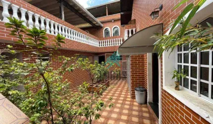 Casa com 3 dormitórios à venda, 257 m² por R$ 1.050.000,00 - Vila Scarpelli - Santo André/SP