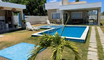 Casa com 3 dormitórios à venda, 230 m² por R$ 1.250.000,00 - Barra do Jacuípe - Camaçari/BA