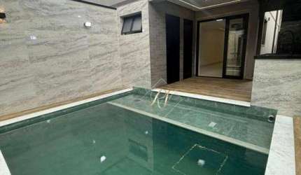 Sobrado com 4 dormitórios à venda, 204 m² por R$ 1.690.000,00 - Boqueirão - Praia Grande/SP