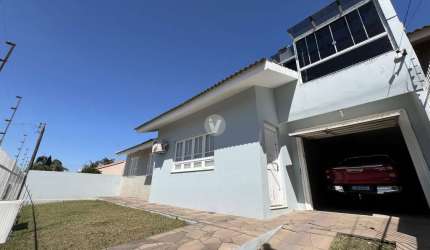 Ampla casa á venda com 3 dormitórios e 3 vagas de garagem em Camobi!