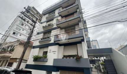 Apto 2 dormitórios com dependência, no centro, garagem, sacada!