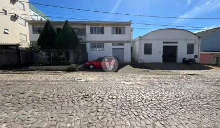 Casa comercial excelente localização com loja e pavilhão