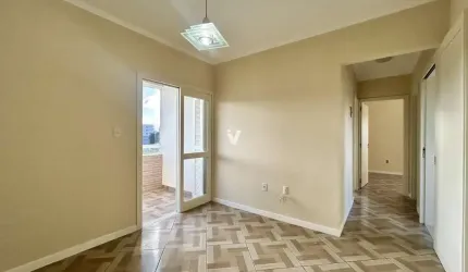 Apartamento dois dormitórios com box de garagem no bairro Camobi.