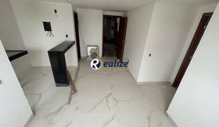 Apartamento composto por 1 quarto com Área de Lazer á venda na Praia do Morro, Guarapari-ES - Realize Negócios Imobiliários.
