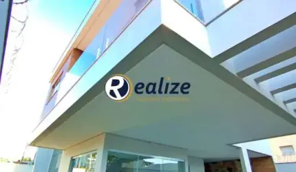 Casa Duplex composto por 3 quartos com Área Gourmet á venda no Bairro Itapebussu, Guarapari-ES - Realize Negócios Imobiliários.